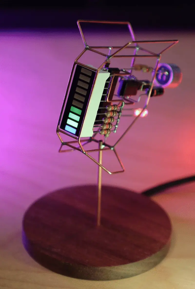A six-panel image shows a steampunk-style electronic device with a vertical LED bar that gradually fills from bottom to top…