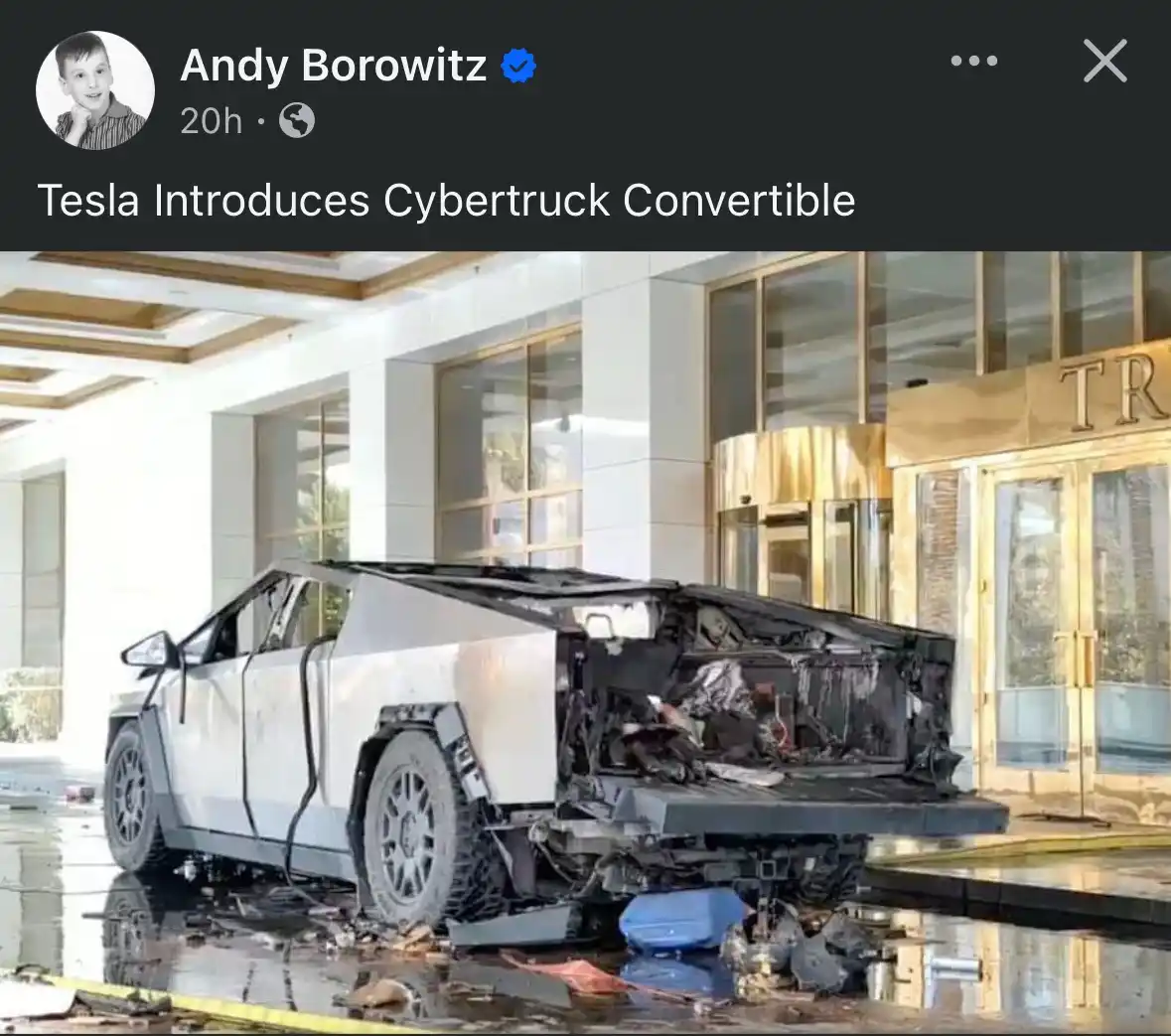 A heavily damaged white Tesla Cybertruck is shown with its rear and side panels torn off, exposing internal components…