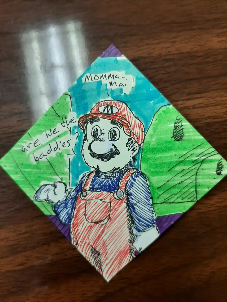 A hand-drawn, colored illustration of Mario from the Super Mario video game series, depicted on a diamond-shaped piece of…