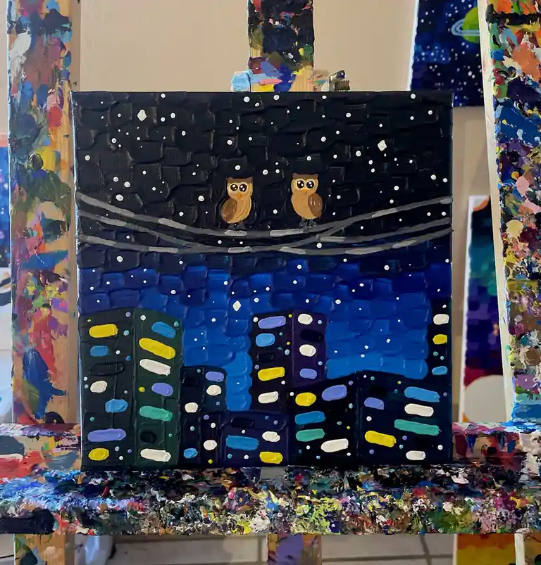 A textured, thickly painted canvas depicts two cartoonish brown owls with large eyes perched on a wire against a starry…