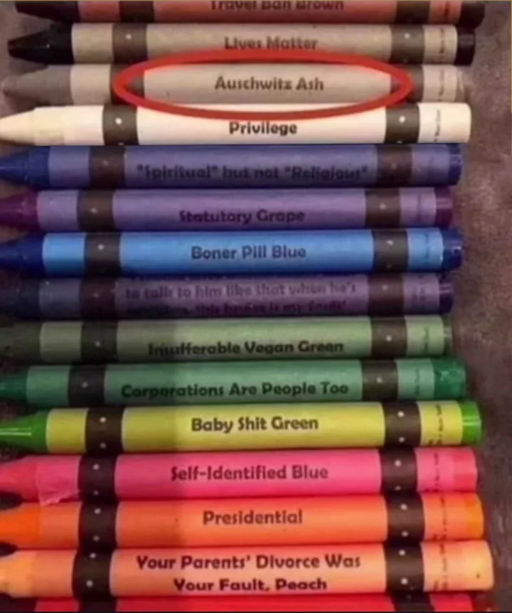 A vertical stack of colorful crayons, each labeled with provocative or satirical phrases like 'Lives Matter', 'Auschwitz…