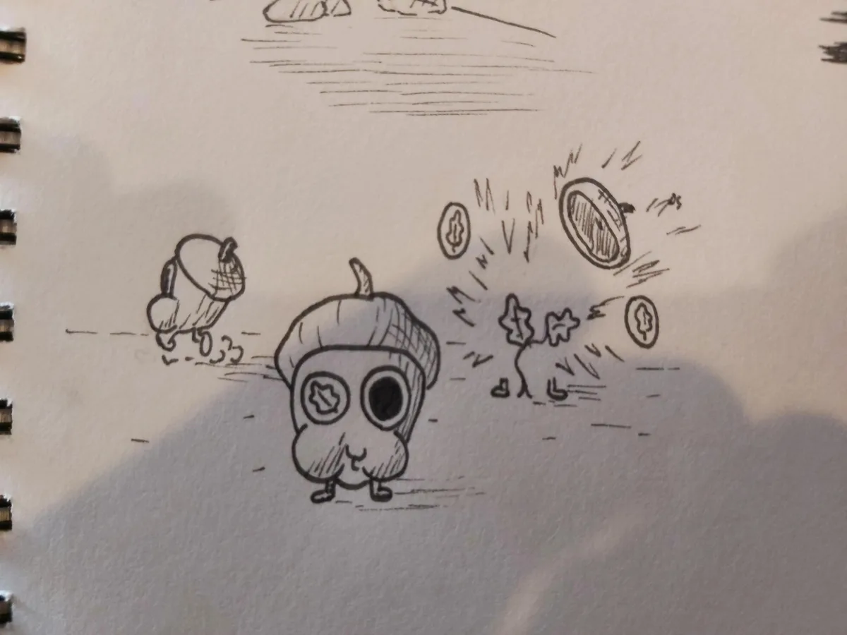 A hand-drawn black-and-white comic strip in a spiral-bound notebook shows three cartoon acorns. One acorn in the center has…