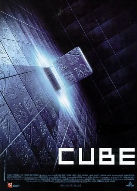 A movie poster for the film 'Cube' shows a glowing, mysterious cube floating in a dark, tiled room with geometric patterns…