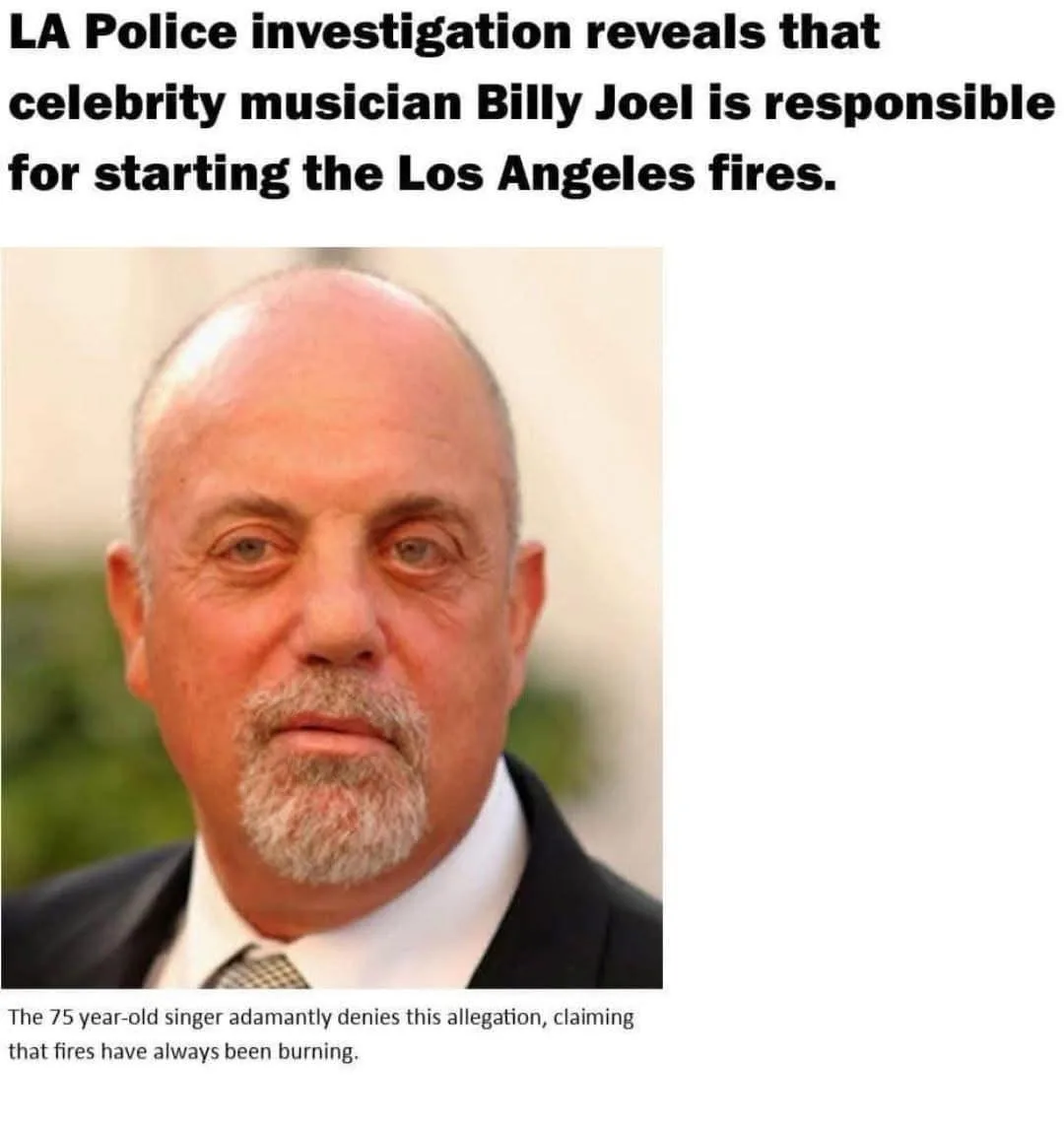 The image shows a close-up of a balding, middle-aged man with a gray goatee, wearing a dark suit and tie, looking directly…