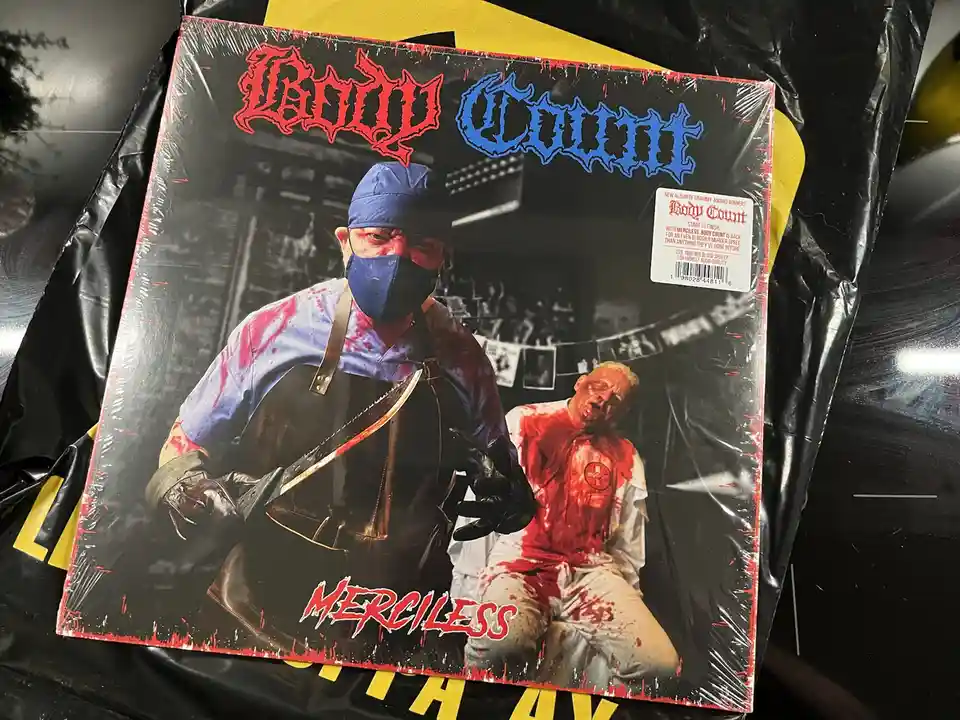 A sealed vinyl record album cover for 'Body Count' with the album title 'Merciless' visible. The artwork features a man in…