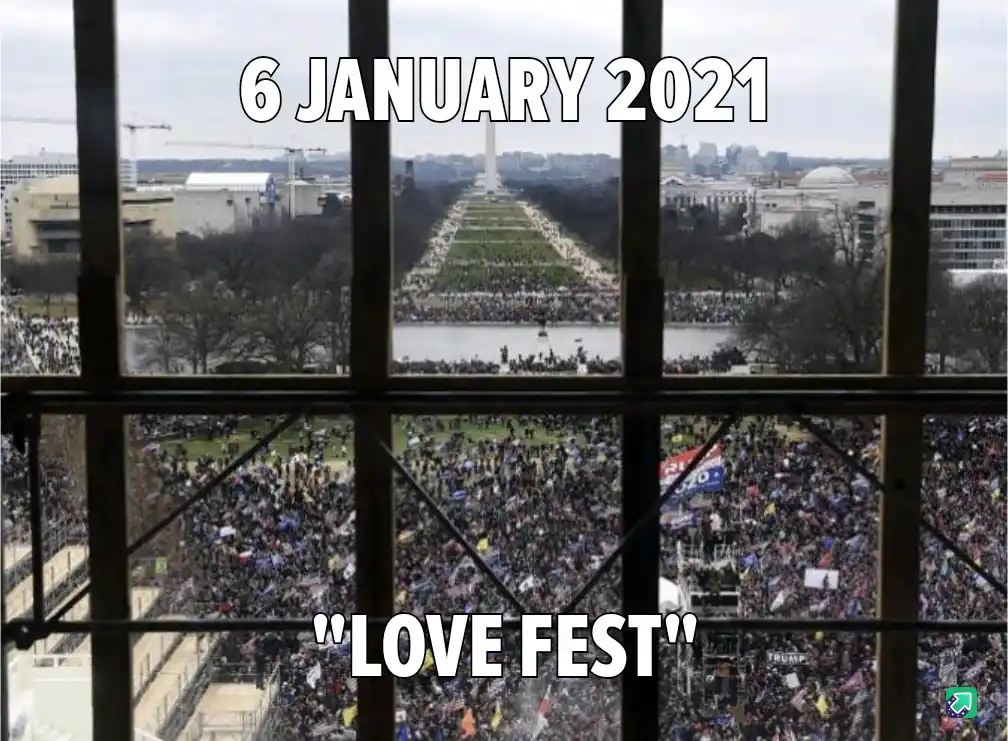 An aerial view through a window frame shows a massive crowd gathered on the National Mall in Washington D.C., with the…