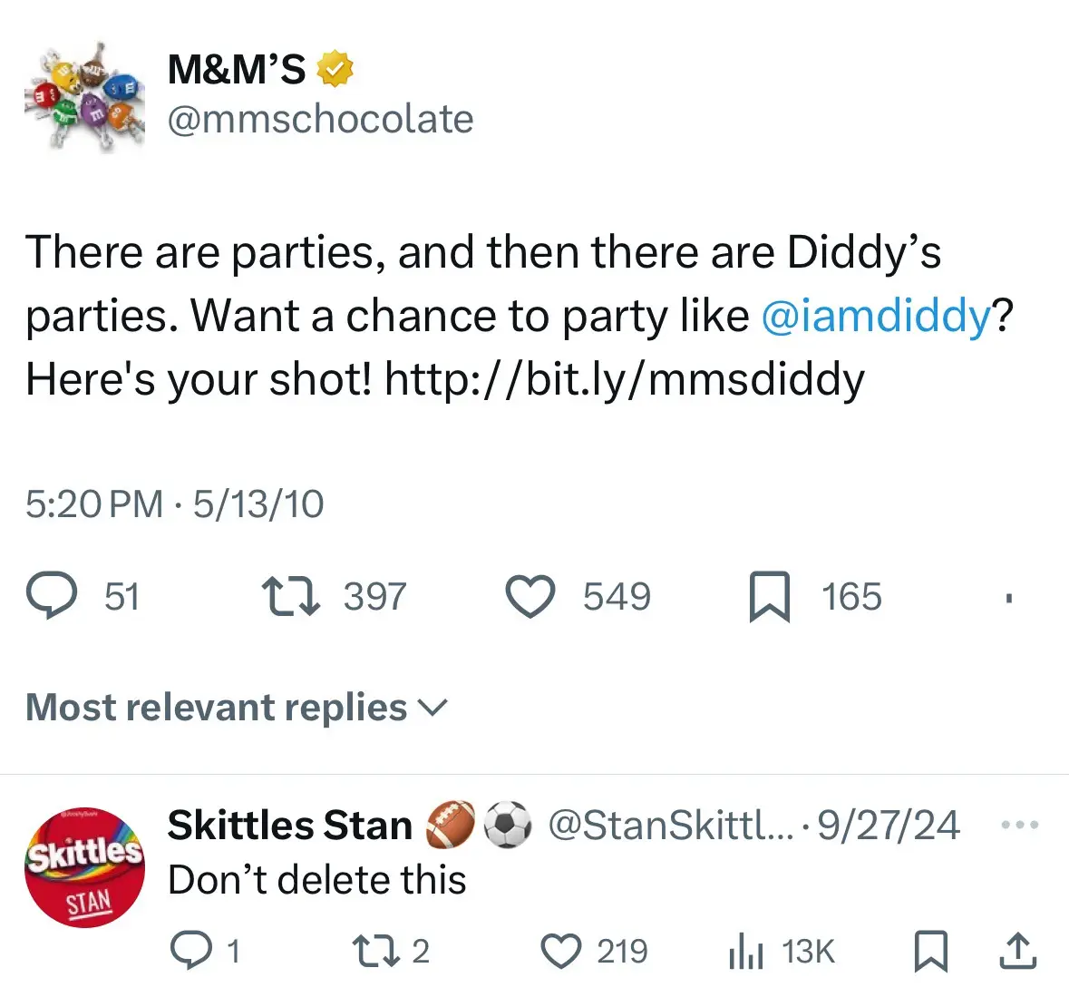 A screenshot of an old M&M's tweet from 2010 promoting a party contest with a link, followed by a reply from a Skittles…