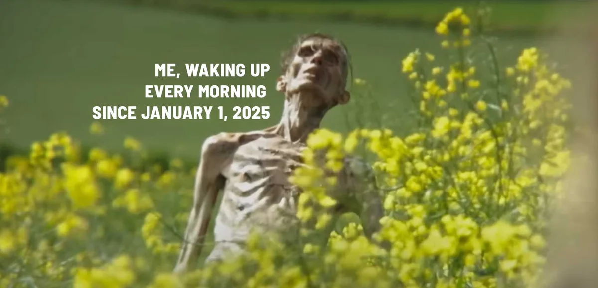 A severely emaciated, skeletal human figure stands in a field of yellow flowers, looking upward with a weary expression…