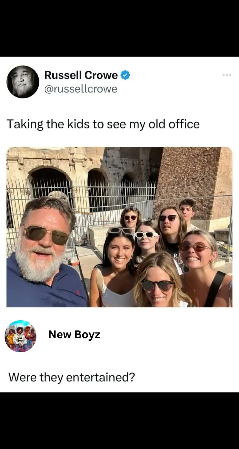 A screenshot of a Twitter post by Russell Crowe showing him and a group of young people posing for a selfie in front of the…