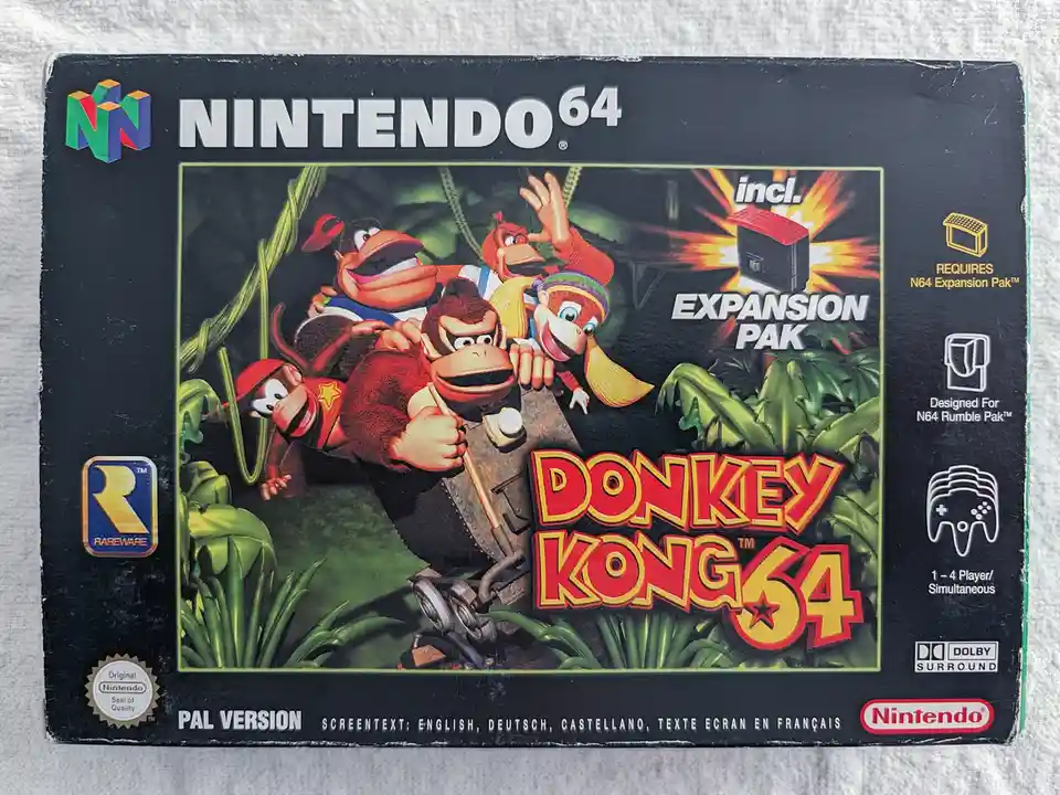 The image shows the front cover of the Nintendo 64 game 'Donkey Kong 64', featuring the main characters in a jungle setting…