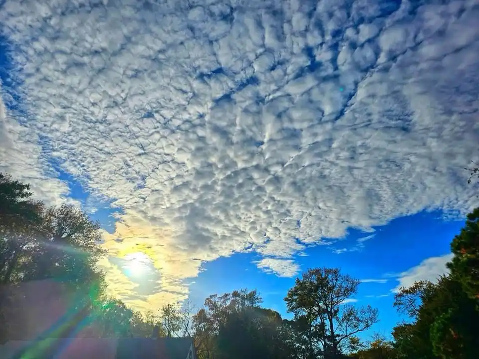 A beautiful day filled with fluffy clouds.