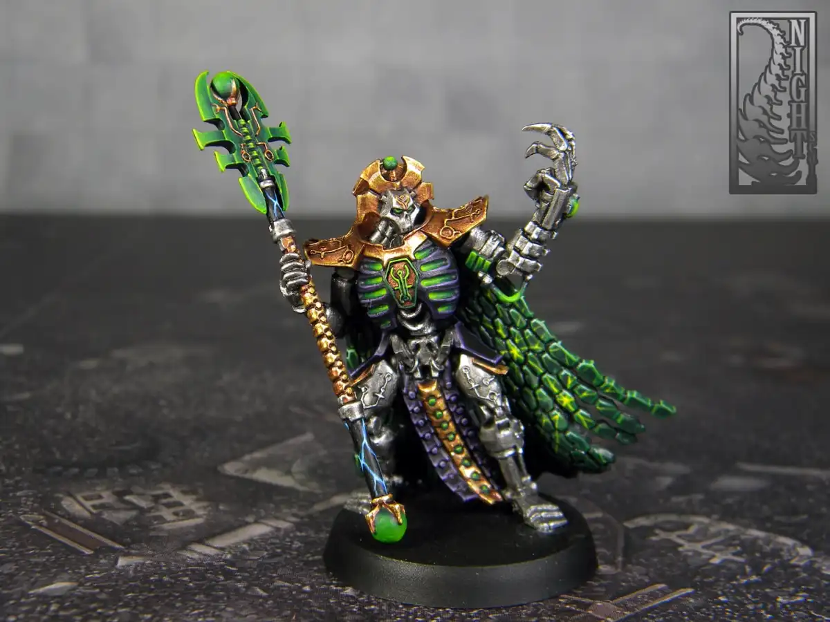 A painted miniature of a green-skinned, armored fantasy warrior with glowing green eyes, holding a large ornate staff and a…