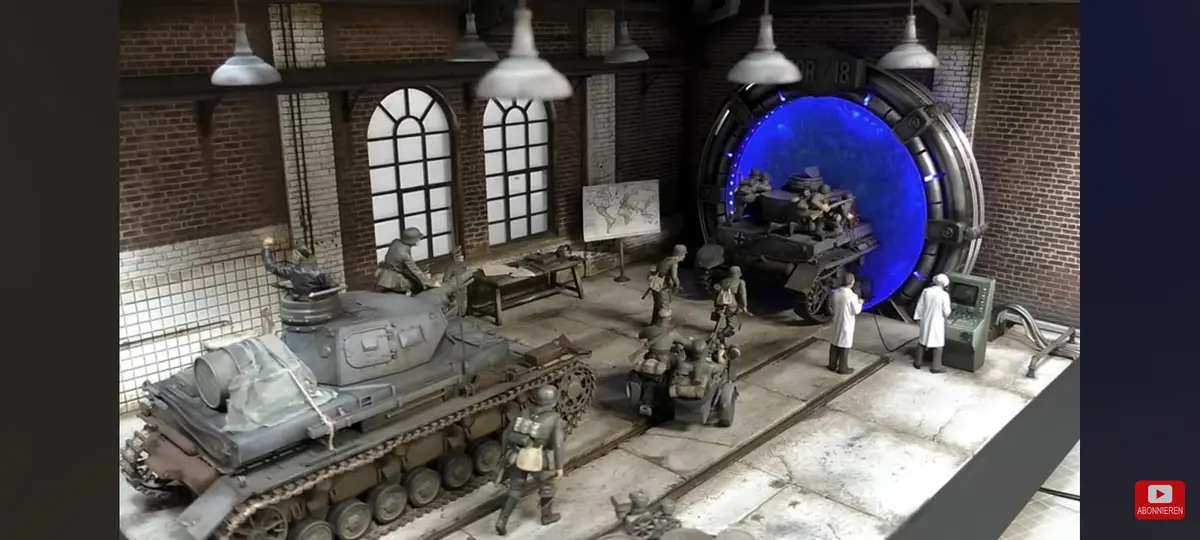 A diorama of a World War II German military base features miniature soldiers, tanks, and a large circular portal emitting…
