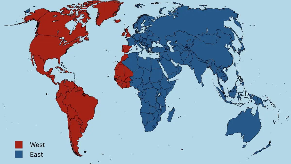 A world map colored in red and blue, with red representing 'West' and blue representing 'East', showing North and South…