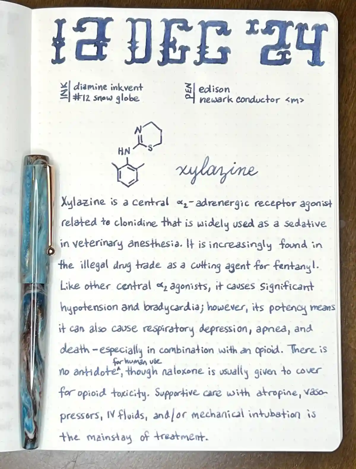 A handwritten notebook page dated '12 DEC '24' shows a chemical structure and detailed medical description of xylazine, a…