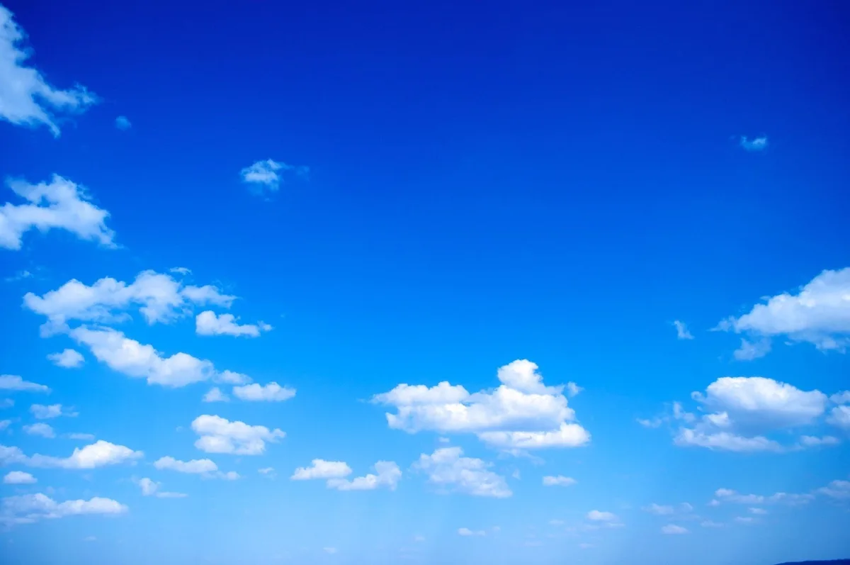 A bright blue sky with scattered white clouds, overlaid with the text 'i'm not crying, you're crying.' The image is a common…