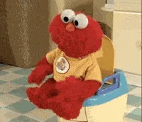 A sequence of six frames shows the red, furry Sesame Street character Elmo sitting on a child-sized potty chair with a blue…