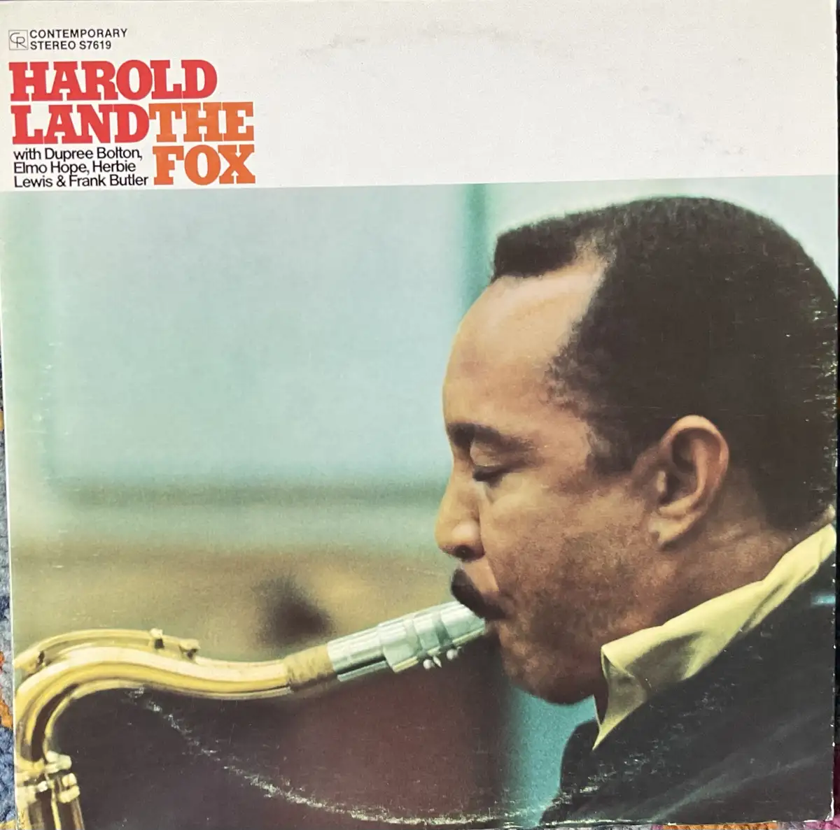 The image is the album cover for 'Harold Land The Fox' by jazz saxophonist Harold Land, showing him in profile playing a…
