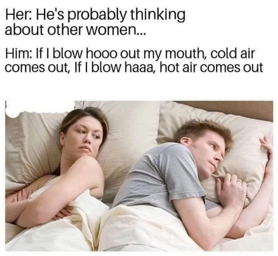 A man and woman lie in bed, turned away from each other, appearing to be in a disagreement. The woman looks skeptical and…
