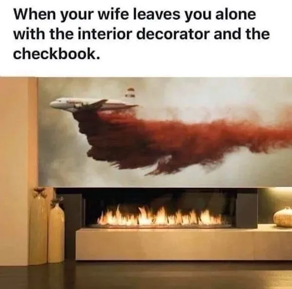 A modern fireplace with a large painting above it depicting a fire-fighting airplane dropping red retardant. The overlaid…