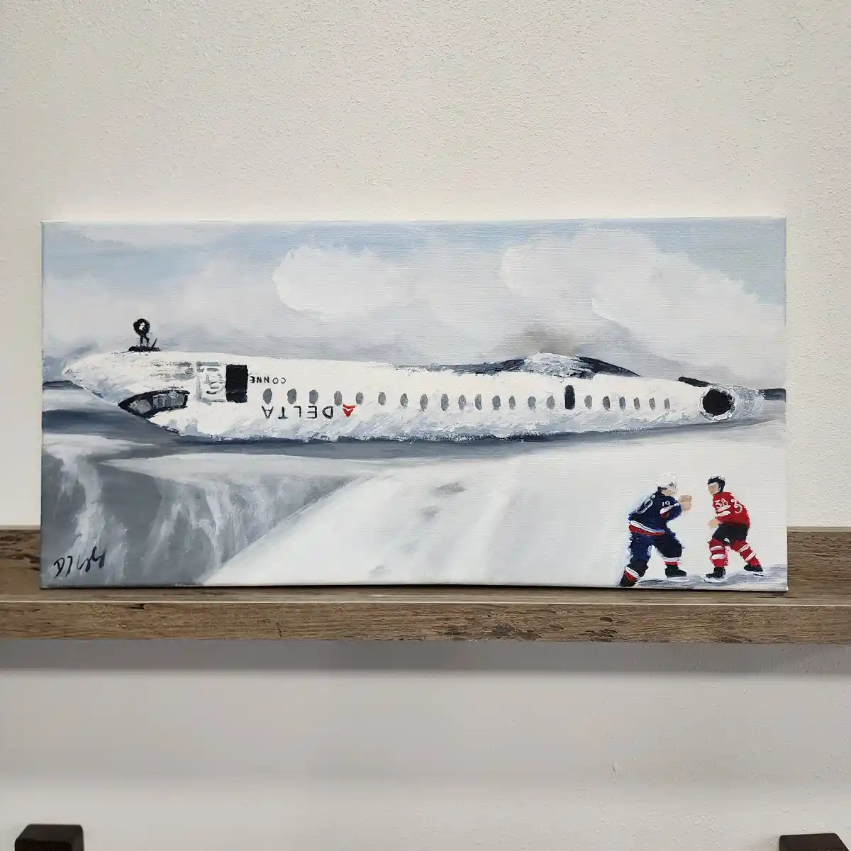 A painting depicts a snowy scene where a large Delta airplane is partially submerged in a waterfall, while two small hockey…