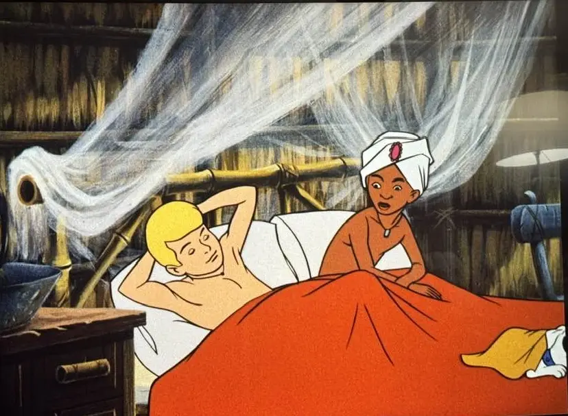 A classic animated scene shows a blonde man sleeping in bed under a mosquito net while a woman in a white headscarf sits…