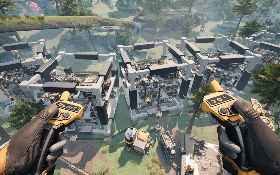 A first-person view from a video game showing gloved hands holding yellow control devices, overlooking a sprawling…