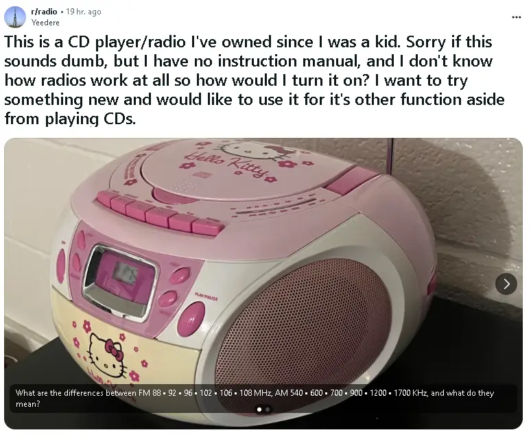 A pink Hello Kitty branded CD player/radio sits on a surface, with overlaid text asking for help understanding FM and AM…
