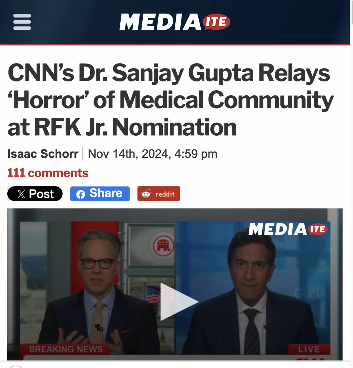 A screenshot of a Mediaite article header showing a video thumbnail with two men in suits, one with glasses and a patterned…