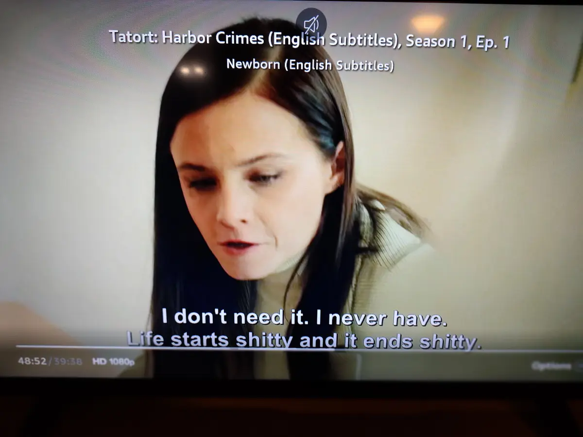 A screenshot from the TV show 'Tatort: Harbor Crimes' Season 1, Episode 1, titled 'Newborn,' shows a woman with dark hair…