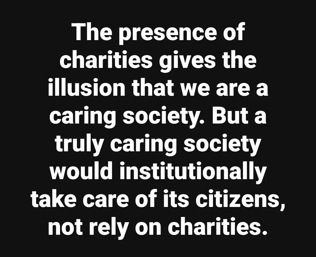 A black background with white text that reads: 'The presence of charities gives the illusion that we are a caring society…
