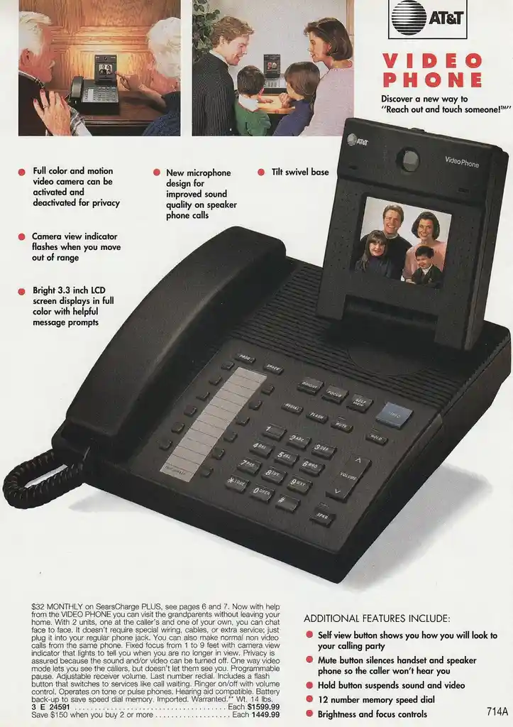 This is a vintage AT&T advertisement for a video phone, featuring a large black device with a small screen showing a family…