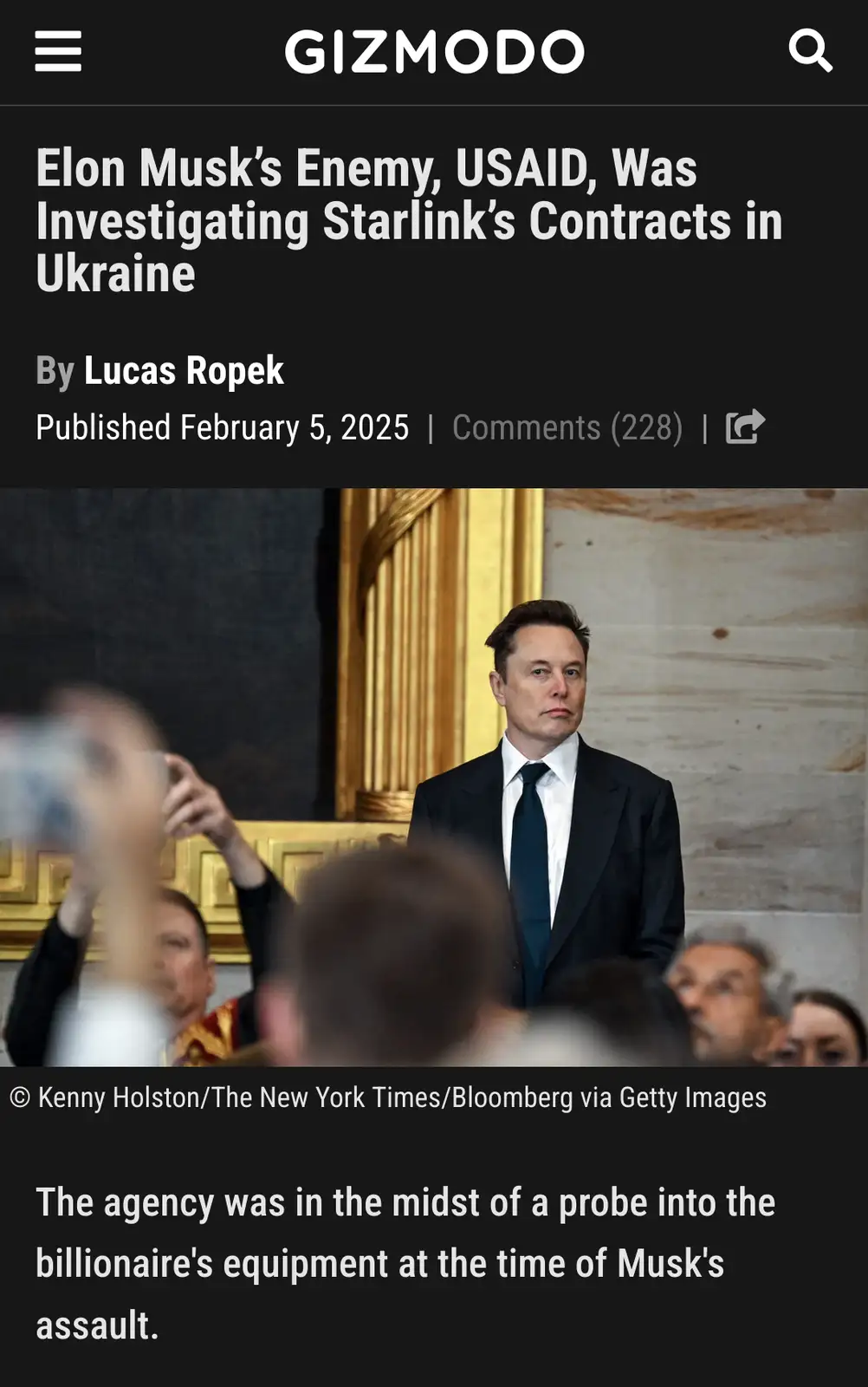 A screenshot of a Gizmodo article shows a photo of Elon Musk in a dark suit and tie, looking serious while standing in front…