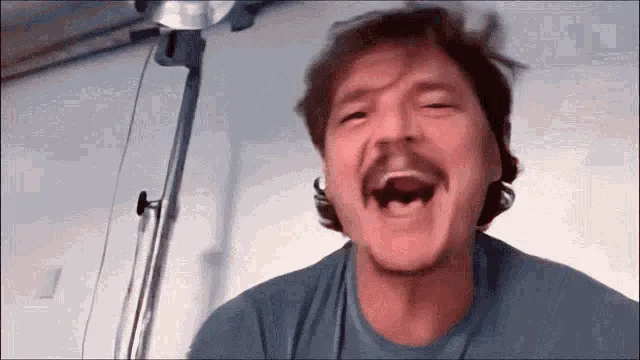A six-panel image sequence shows a man with a mustache in a blue shirt, initially laughing hysterically, then transitioning…