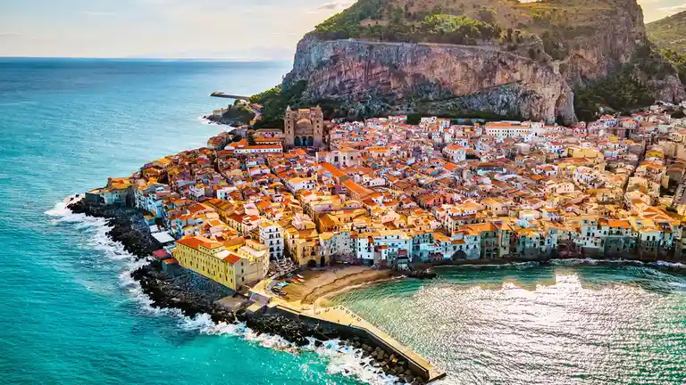 The charming cityscape of CefalÃÂ¹, Sicily, is dominated by the 885-foot Rock of CefalÃÂ¹ and the iconic CefalÃÂ¹…