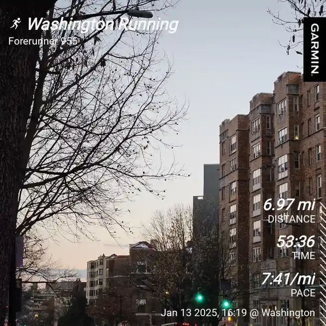 A screenshot of a Garmin Forerunner 955 running watch displaying a workout in Washington, showing 6.97 miles run in 53…