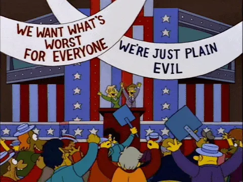A three-panel comic strip from The Simpsons shows a crowd at a political rally with banners reading 'WE WANT WHAT'S WORST…