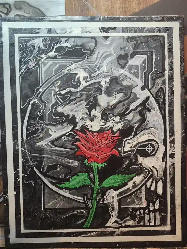 A painting depicts a vibrant red rose with green stem and leaves, positioned in front of a stylized skull with a crosshair…