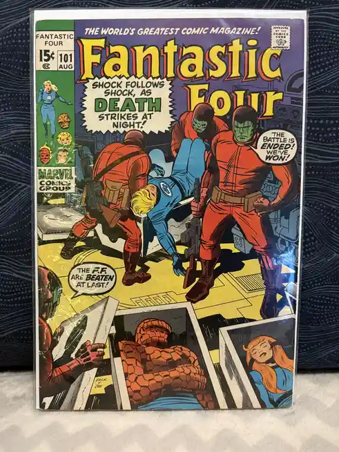 The cover of Fantastic Four #101 shows the team's enemies celebrating their victory over the Fantastic Four, who are…