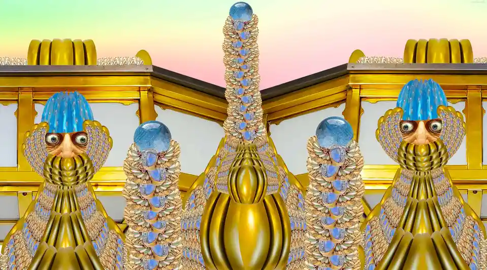 The image displays a surreal, symmetrical composition of ornate golden statues with human faces, blue gemstone crowns, and…