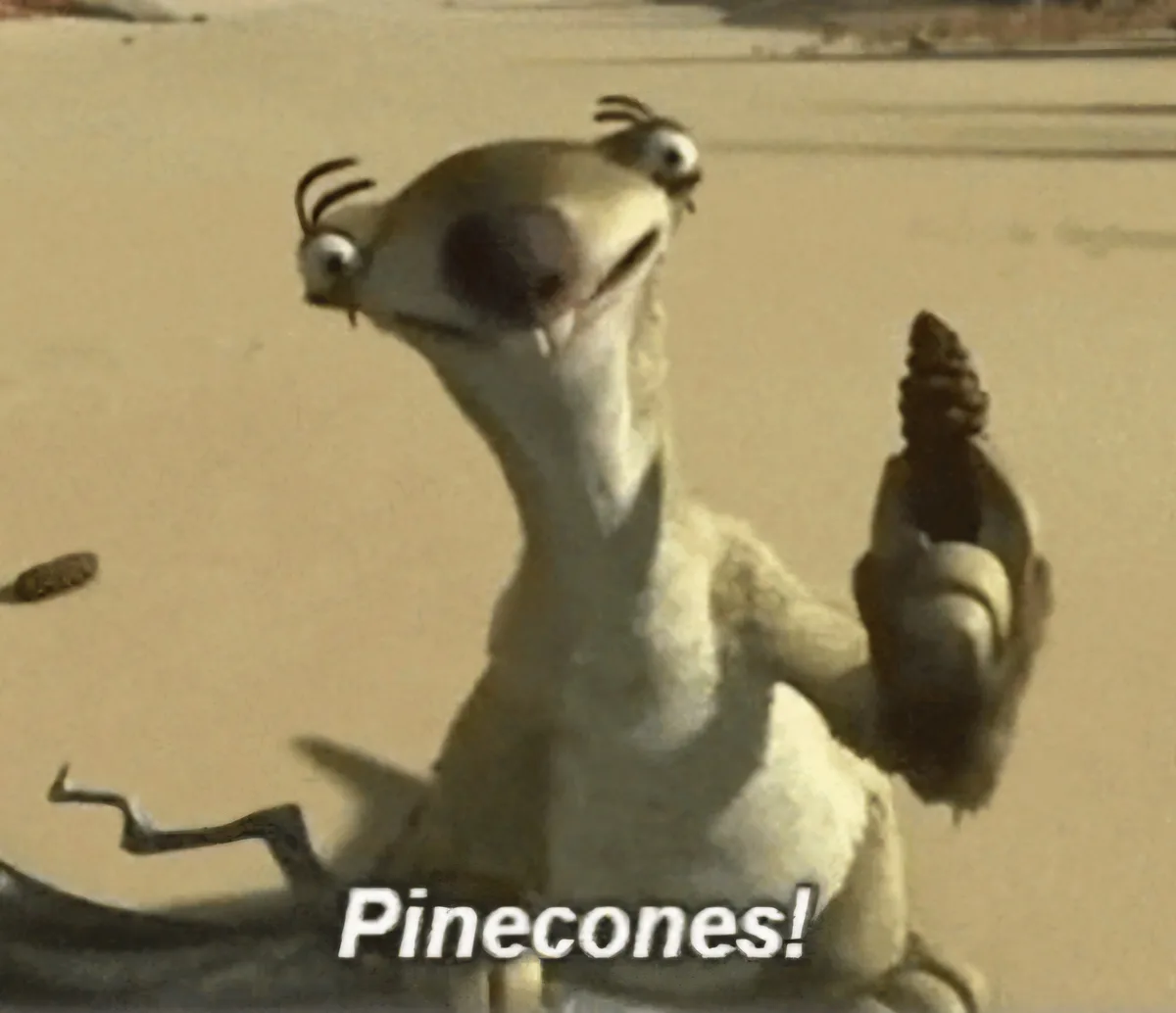A close-up of the animated sloth character Scrat from Ice Age, holding a pinecone with an ecstatic, wide-eyed expression. He…