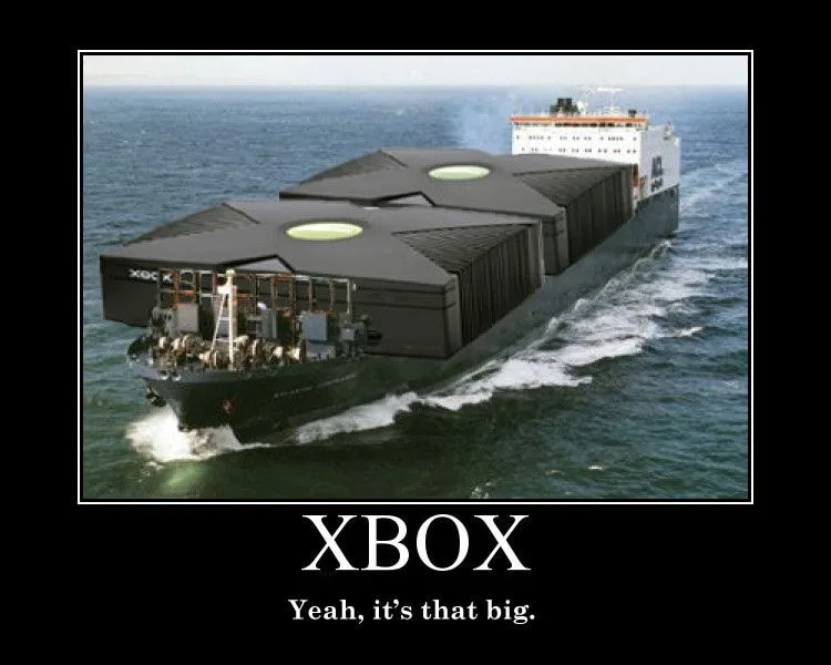 A cargo ship is shown sailing on the ocean, with its cargo containers replaced by giant Xbox consoles. The text overlaid at…