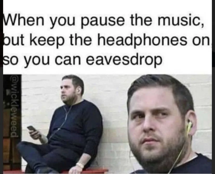 A man sits on a bench holding a phone, wearing headphones, looking off to the side. A close-up of his face is overlaid on…