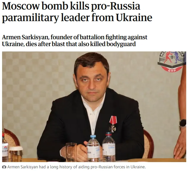 A news article screenshot shows a man in a black suit sitting at a table with water bottles, looking somber. The headline…