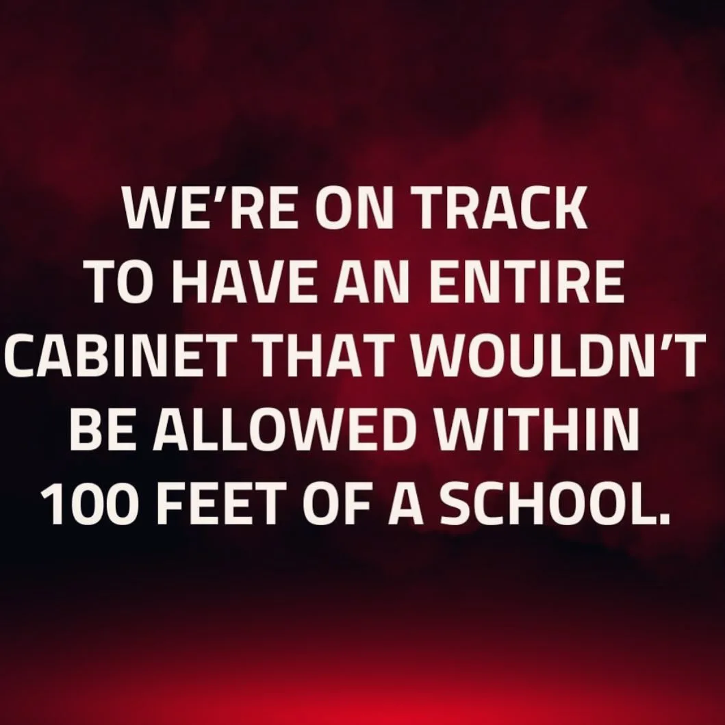The image features bold white text centered on a dark red, smoky background. The text reads: 'WE'RE ON TRACK TO HAVE AN…