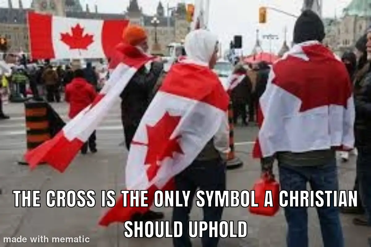 Three people viewed from behind are draped in Canadian flags, standing in a public square with a large Canadian flag visible…