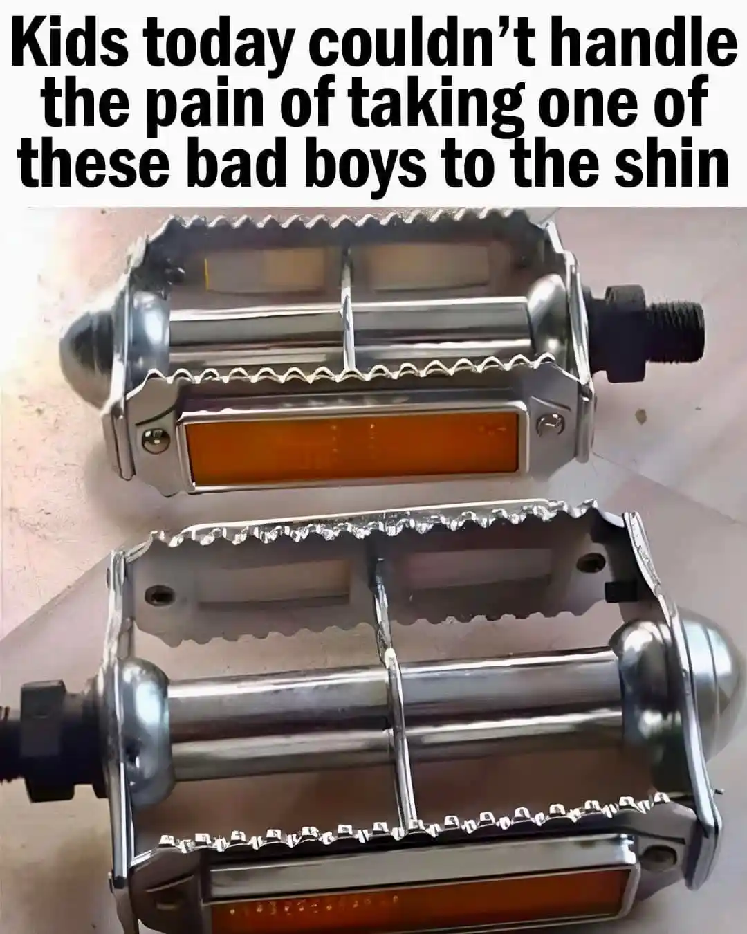 The image displays two chrome bicycle pedals with sharp, serrated edges and orange reflectors, positioned one above the…