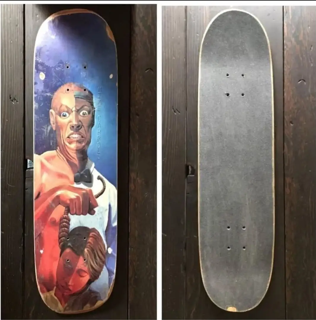 The image displays a skateboard deck split into two views: the left shows the colorful, detailed artwork of a man with a…