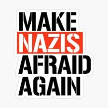A white sticker-style graphic with bold black text reading 'MAKE NAZIS AFRAID AGAIN', where the word 'NAZIS' is highlighted…