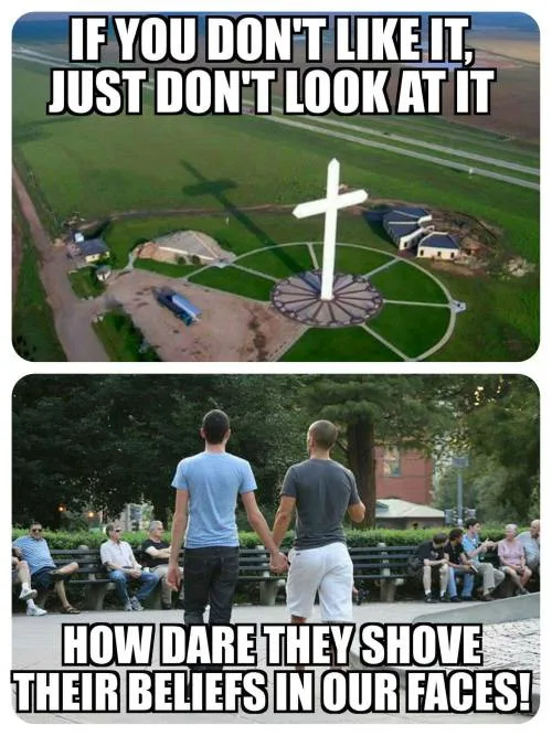 The meme has two panels. The top panel shows an aerial view of a large white cross in a green field with a road nearby…